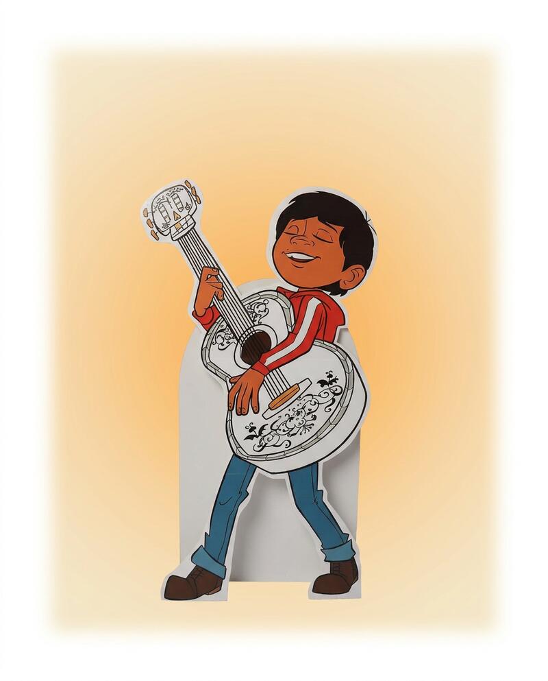 Miguel de Coco con guitarra